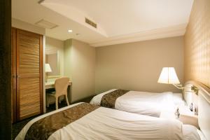 Posteľ alebo postele v izbe v ubytovaní Mikawawan Resort Linx