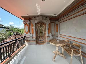 Balkón nebo terasa v ubytování Adipana Bungalow-Balinese Room