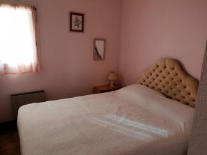 En eller flere senge i et værelse på Appartement T2 à Argelès-sur-Mer - Proche plage, parking privé, loggia sud, 4 couchages - FR-1-388-4 + 5 billeder