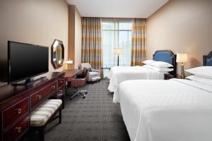 Voodi või voodid majutusasutuse Sheraton McKinney toas