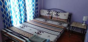 Ένα ή περισσότερα κρεβάτια σε δωμάτιο στο Lemon Transient House