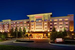 a large building with a serkota sign on it at Sheraton Rockville in Rockville