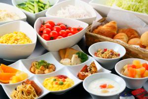 a bunch of bowls filled with different types of food at Sasebo Washington Hotel in Sasebo +20 photos