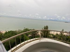 a balcony with a view of the ocean at Jazz Rainbow Paradise beachfront Peanag in Tanjung Bungah