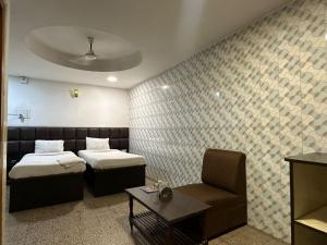 Postel nebo postele na pokoji v ubytování Hotel Deendayal + 45 fotografií