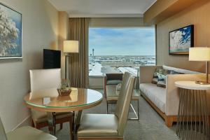 a living room with a couch and a table at The Westin Denver International Airport in Denver