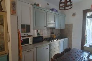 Kuchyň nebo kuchyňský kout v ubytování Residenza Anna