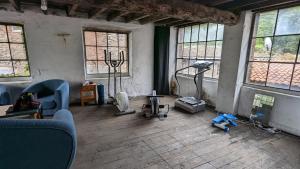 Posilňovňa alebo fitness centrum v ubytovaní Le moulin de Thiers-lamaisondefrancois03