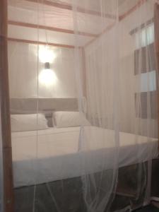 Postel nebo postele na pokoji v ubytování Chameera guest house