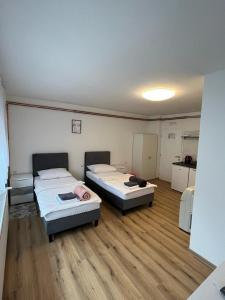 Posteľ alebo postele v izbe v ubytovaní OPG - ZM APARTMANI MARTINOVIĆ