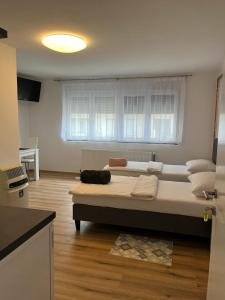 Posteľ alebo postele v izbe v ubytovaní OPG - ZM APARTMANI MARTINOVIĆ
