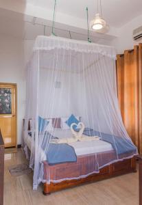 Letto o letti in una camera di Ravana Range Ella