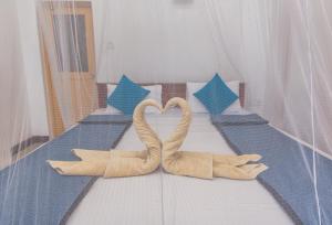 Letto o letti in una camera di Ravana Range Ella