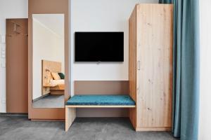 Televisyen dan/atau pusat hiburan di Gästehaus Bosch