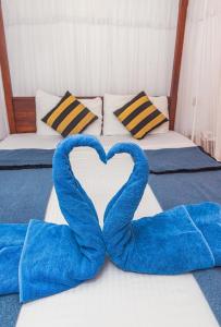 Letto o letti in una camera di Ravana Range Ella
