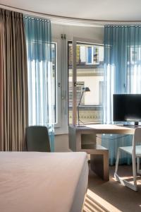 TV a/nebo společenská místnost v ubytování Hotel Continental Park
