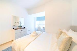 Postel nebo postele na pokoji v ubytování NEW! Amazing stay at Elite Residence Dubai Marina