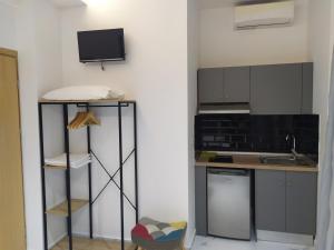 A kitchen or kitchenette at Studios Periklis