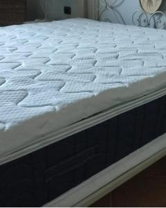 a close up of a mattress on a bed at La Casa Di Stefania in Pollutri +37 photos