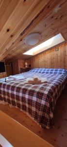Un pat sau paturi într-o cameră la Aprica 11 Life Mountain