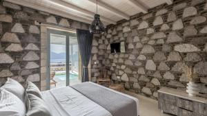 Letto o letti in una camera di Thea Sunset Suites