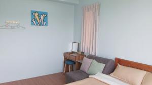 Postel nebo postele na pokoji v ubytování Chin-Lan B&B
