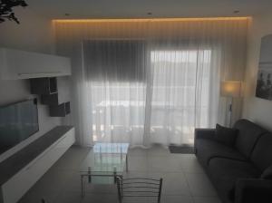 Posezení v ubytování The Penthouse Suite @ Court Twenty-Five