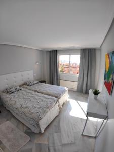 Posteľ alebo postele v izbe v ubytovaní La Reserva de Marbella Penthouse