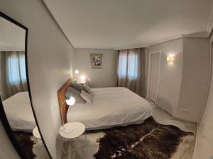 Posteľ alebo postele v izbe v ubytovaní La Reserva de Marbella Penthouse