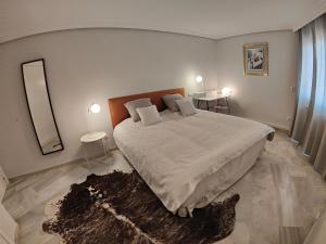 Posteľ alebo postele v izbe v ubytovaní La Reserva de Marbella Penthouse