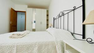 Postel nebo postele na pokoji v ubytování Suite Dream Capricho