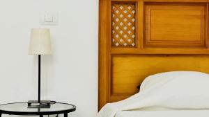 Postel nebo postele na pokoji v ubytování Suite Dream Capricho