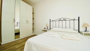 Postel nebo postele na pokoji v ubytování Suite Dream Capricho