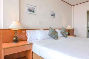 Postel nebo postele na pokoji v ubytování Rattana Park Hotel + 37 fotografií
