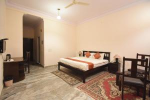 Voodi või voodid majutusasutuse Satyam Palace Resort toas