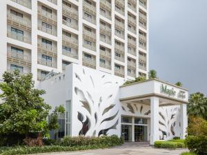 una representación del exterior del hotel mgm en Maple Hotel en Bangkok