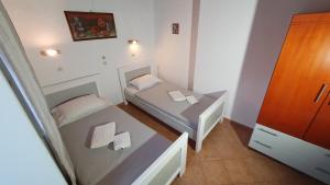 Postel nebo postele na pokoji v ubytování ASTORIA lindos