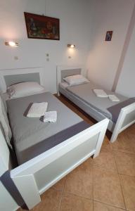 Postel nebo postele na pokoji v ubytování ASTORIA lindos