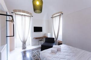 A bed or beds in a room at Viasarnelli72