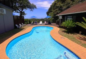 Bazén v ubytování St Lucia Ocean View Lodge nebo v jeho okolí