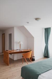 Postel nebo postele na pokoji v ubytování Hotel Cristallo