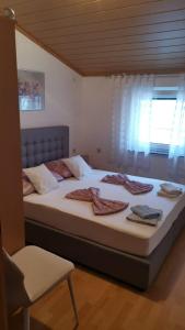 Posteľ alebo postele v izbe v ubytovaní Apartman Tunja