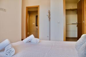 Katil atau katil-katil dalam bilik di Click&Guest - Sun dream house