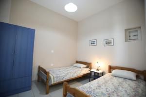 Letto o letti in una camera di Pavlidis