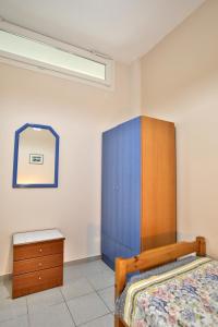 Letto o letti in una camera di Pavlidis