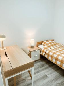 Кровать или кровати в номере Golden Place-Costa da Caparica