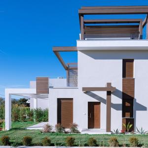 a rendering of a house in the desert at Argilos Residential Complex in Ofrínion