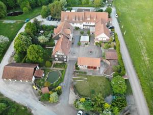 an aerial view of a house with a yard at Landhotel Furthmühle in Grabe