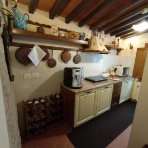 Η κουζίνα ή μικρή κουζίνα στο Il casale del Domo +39 φωτογραφίες