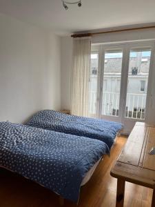 Postel nebo postele na pokoji v ubytování Maison des dunes proche plage + 1 fotografie